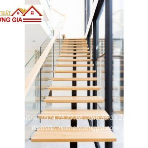 Cầu thang xương cá lan can kính nội thất vương gia