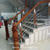 cầu thang inox tay vịn gỗ tại hà đông hà nội nội thất vương gia