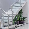 Cầu thang kính con tiện tay vịn inox cao cấp