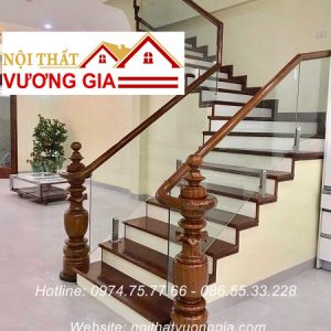 Thi công cầu thang kính cường lực tay vịn gỗ
