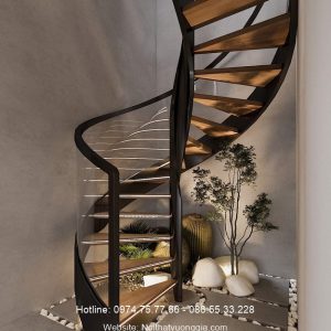 cầu thang xương cá xoắn ốc lan can kính cong