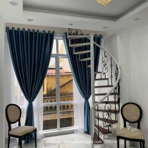 Cầu thang xoắn tâm cột lan can sắt nghệ thuật